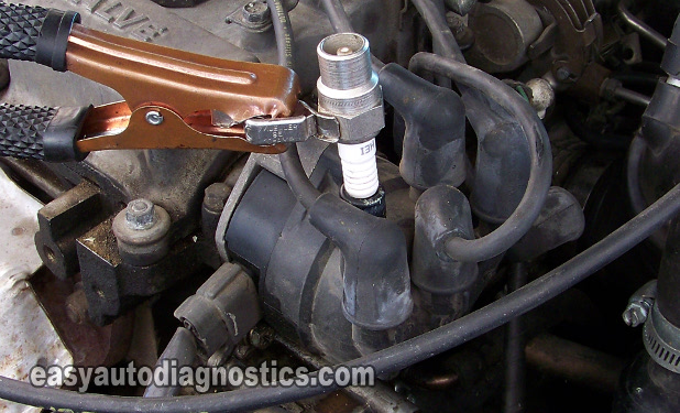 Testing For Spark At The Distributor Cap. Power Transistor Test And Ignition Coil Test 2.4L Nissan Altima (1993-1997)