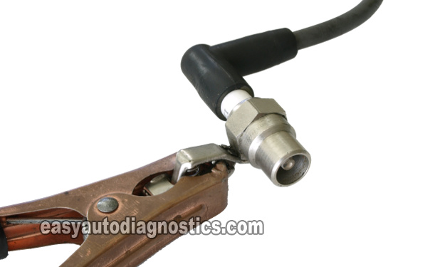 Checking The Ignition Coil High Tension Wire For Spark. How To Test The Ignition Coil (1988, 1989, 1990, 1991, 1992, 1993 2.8L V6 Chevrolet S10 Pickup, GMC S15 Pickup, GMC Sonoma) Checking The Ignition Coil High Tension Wire For Spark. How To Test The Ignition Coil (1988, 1989, 1990, 1991, 1992, 1993 2.8L V6 Chevrolet S10 Pickup, GMC S15 Pickup, GMC Sonoma)
