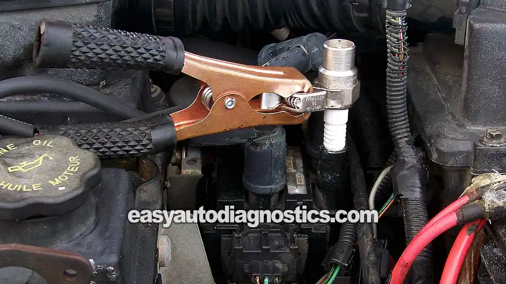 Testing For Spark At The Ignition Coil Pack. How To Test The Ignition Coil Pack (2001, 2002, 2003, 2004 2.0L Ford Escape And Mazda Tribute)