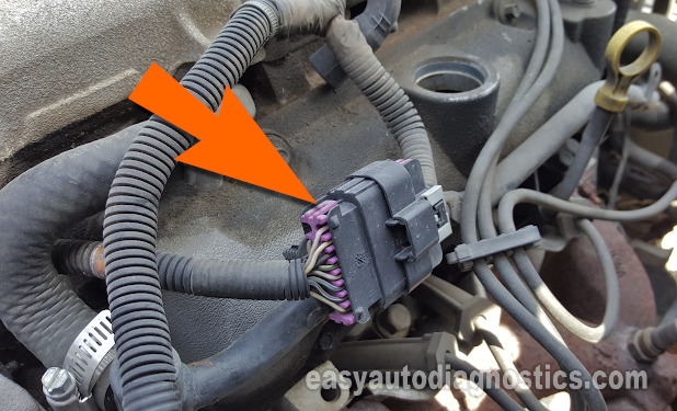 Location Of The Fuel Injector Harness Connector. How To Test The Fuel Injectors On The 2004, 2005, And 2006 3.5L Chevy Malibu.